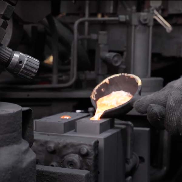 molten metal being poured into cast