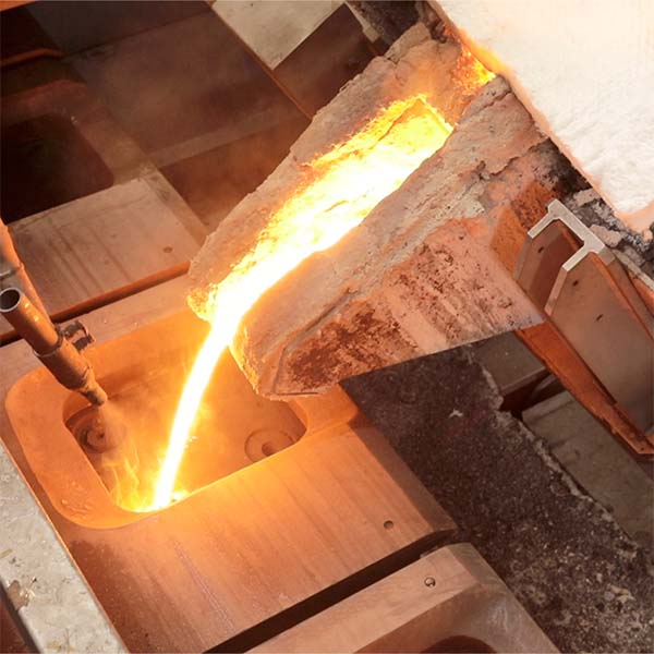 molten metal pouring into cast